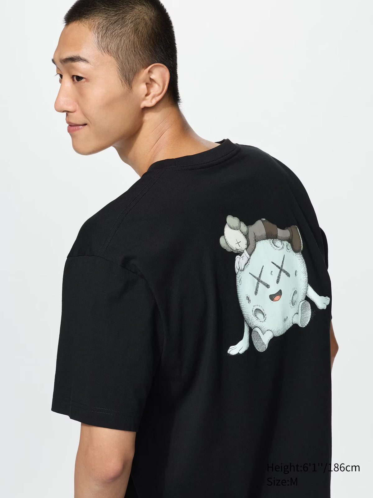 Kaws x Uniqlo Black Back Planet Logo Tee