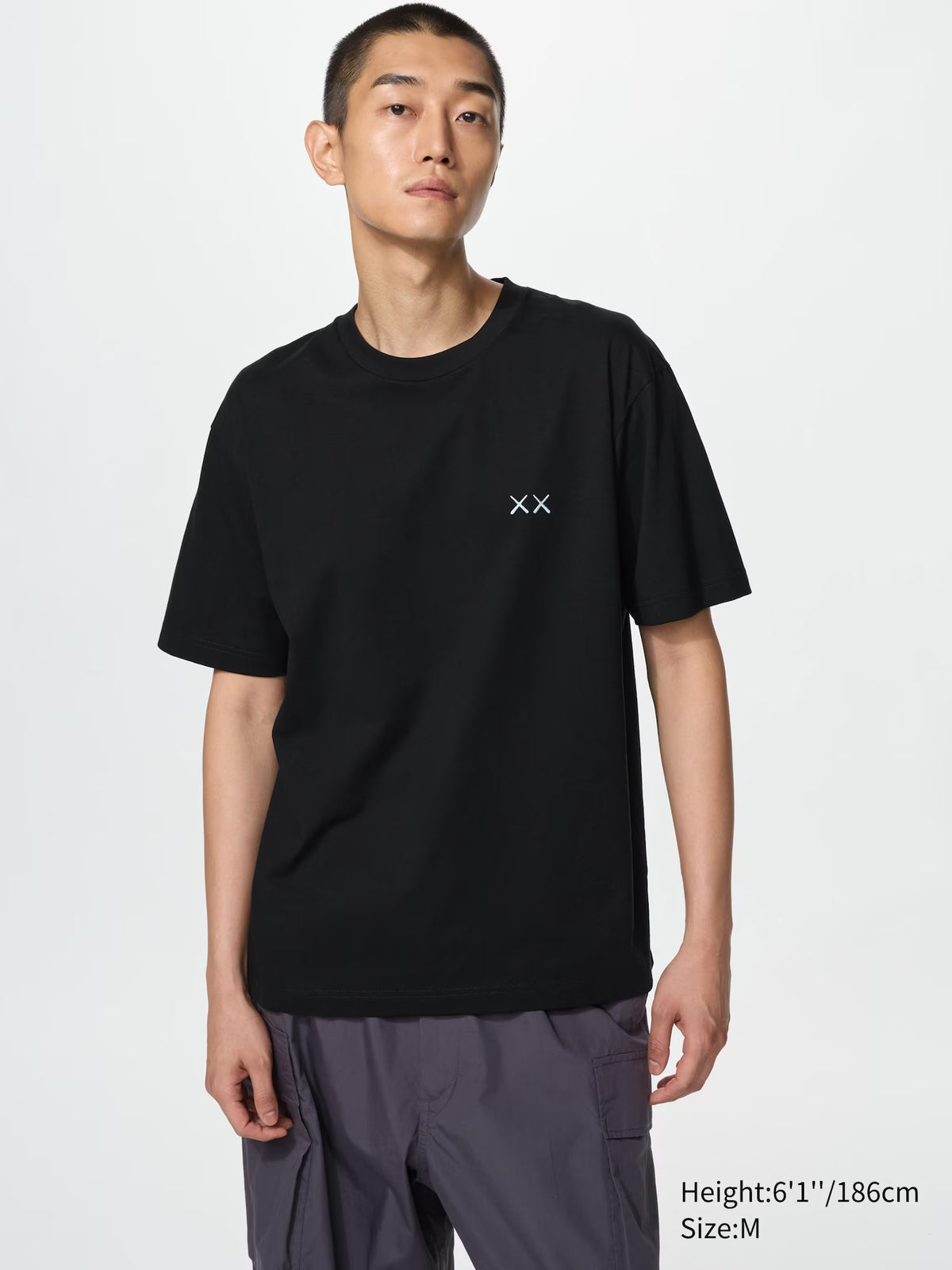 Kaws x Uniqlo Black Back Planet Logo Tee