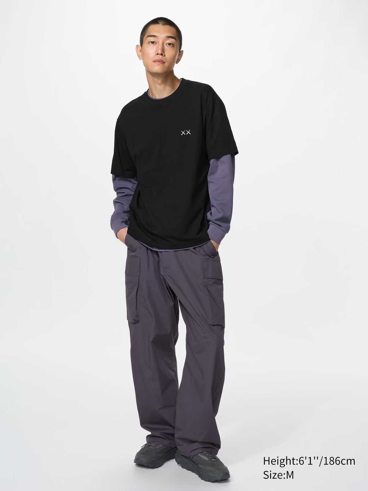 Kaws x Uniqlo Black Back Planet Logo Tee