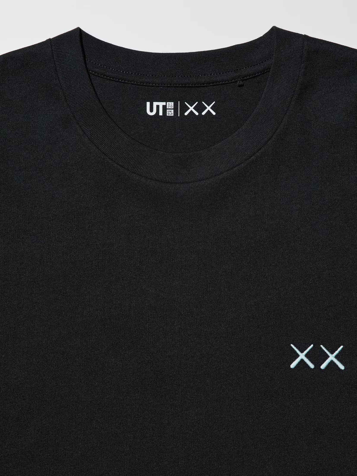 Kaws x Uniqlo Black Back Planet Logo Tee