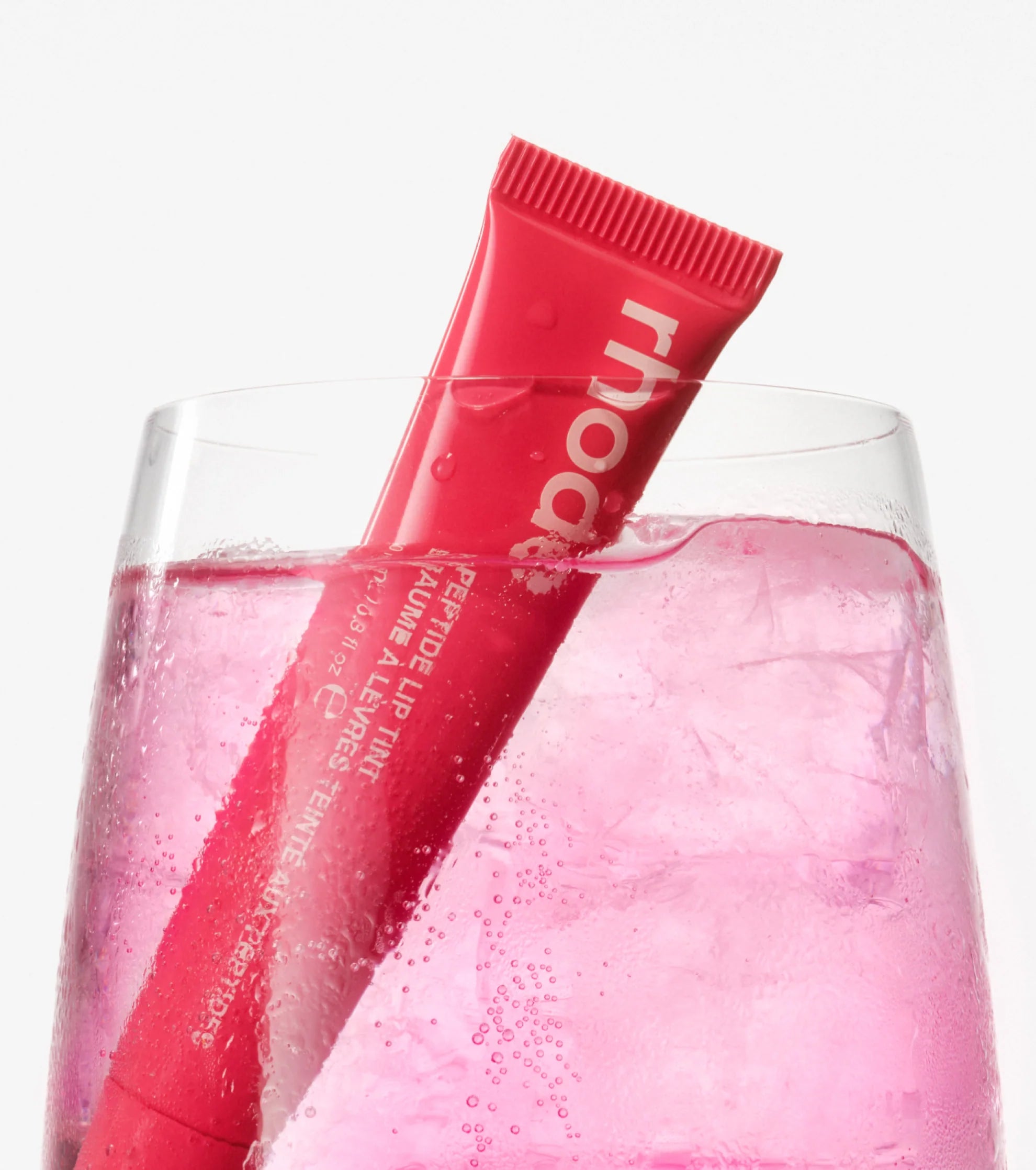 Rhode peptide lip tint guava spritz - bright coral